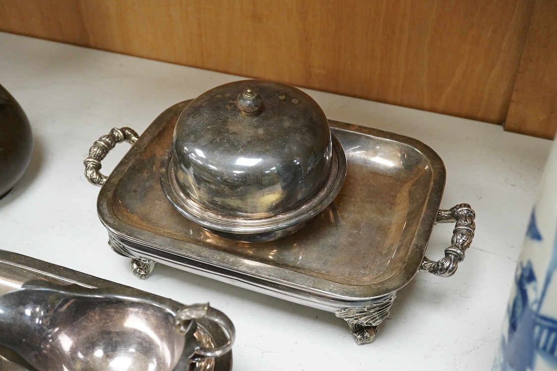 A pair of 19th century plated warming dishes- 36cm wide, a jug, a small plate and dish and cover, (5).